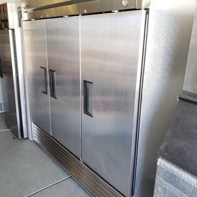 #602: True Stainless Steel 3 Door Refrigerator Model T-72
Measures approximately 78