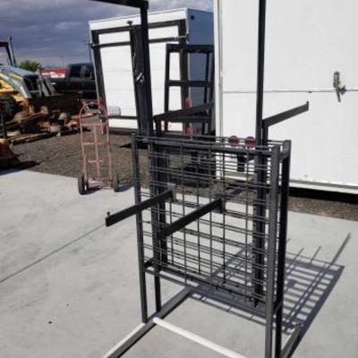 #1299: Metal Clothing Rack.
Measures Approximately 6'Ã— 31