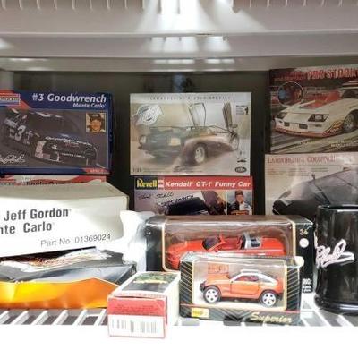 #1437: 1:24 Scale Model Car Kits, Die-Cast Cars, Coffee Mugs and More
Model Kits include Goodwrench Monte Carlo, Atlanta Olympic Games...