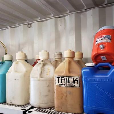 #1340: 9 Plastic 5 Gallon Gas Cans, 3 Plastic Water Containers, and 3 Funnels
9 Plastic 5 Gallon Gas Cans, 3 Plastic Water Containers,...