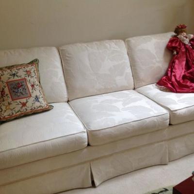 Beautiful white sofa with ottoman