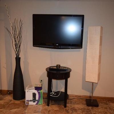 Flat Screen TV, Floor Lamp, Accent Table, Vase W/Floral Accents
