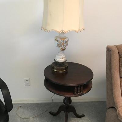 Small brass foot accent table 20 inch diameter 26 1/2 tall