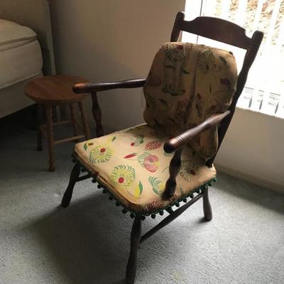 Several old chairs, stools, canes and foot rest 