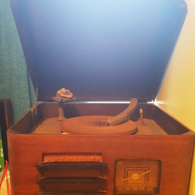 Meters Kilocycle radio record player in wood enclosure     BUY IT NOW $ 65.00.