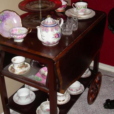 Tea cart, cup and saucer collection