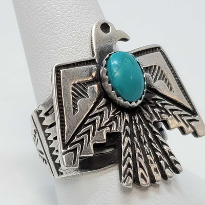 605: 	
Native American Sterling Silver Thunderbird Turquoise Ring, 11.8g
Weighs approx 11.8g, size 9