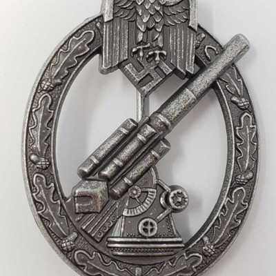 2066:	
German World War II Army Flak Artillery Badge
Measures 1 11/16