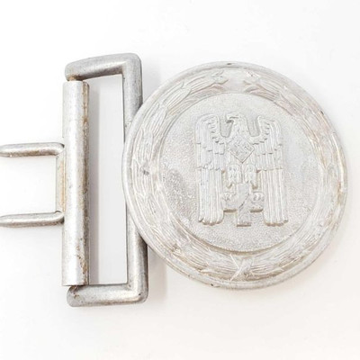2058 	
German World War II Red Cross Officers Belt Buckle
Measures 1 15/16â€ in diameter. The front shows a Red Cross eagle in the...
