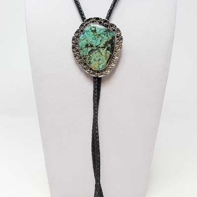 702: 	
Sterling Silver Turquoise Bolo Tie, 54g
Weighs approx 54g, measures approx 35