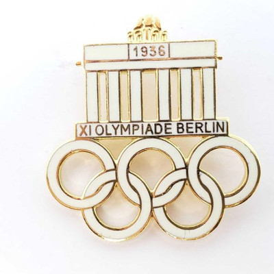 2020: 	
German World War II 1936 Berlin Olympiade Lapel Badge
Measures 1 3/16â€ wide by 1 5/16â€ tall. The front reads â€˜1936 XI...