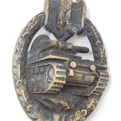 2048: 	
German World War II Army Bronze Tank Assault Badge
The front shows a tank in the center with a German army eagle at the top. Both...