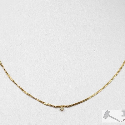 765: 
14k Gold Necklace with Diamond, 1.7g
Weighs approx 1.7g, measures approx 14.5