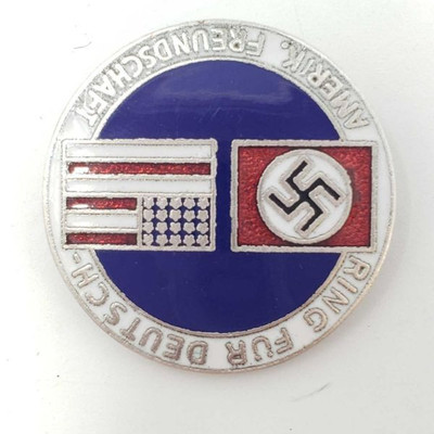 2065: 	
German American World War II Bund Alliance Lapel Badge
Measures 1 1/16â€ in diameter. The front reads â€˜Ring Fur Deutsch...