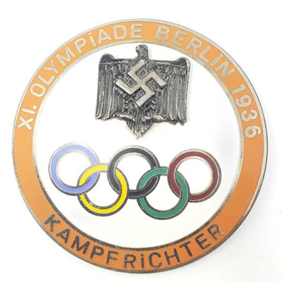 2068: German World War II 1936 Berlin Summer Olympics Judge Badge.
Measures 1 15/16â€ in diameter. The front reads â€˜XI. Olympiade...