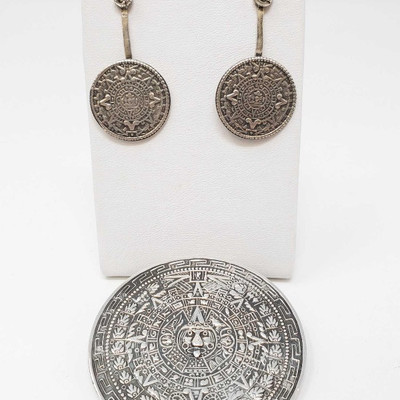 668: 	
Sterling Silver Earrings and Pin, 33.4g
Weighs approx 32.4g
