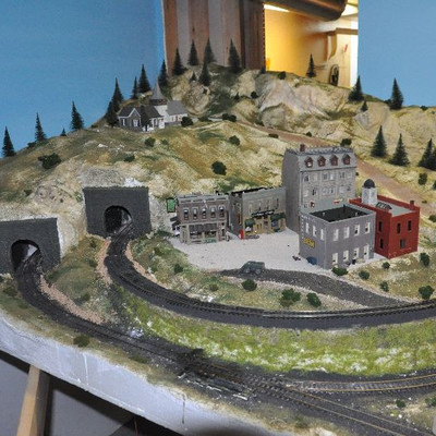 Another view of Bid Package #5- Marklin Train set includes accessories shown in photos.