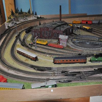 Another view of Bid Package #8- Marklin Train set includes accessories shown in photos.