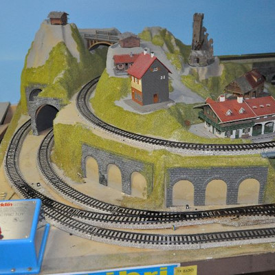 Another view of Bid Package #7- Marklin Train set includes accessories shown in photos.