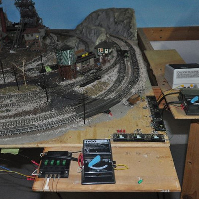 Another view of Bid Package #9- Marklin Train set includes accessories shown in photos.