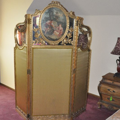This antique French screen is Bid package #13. 