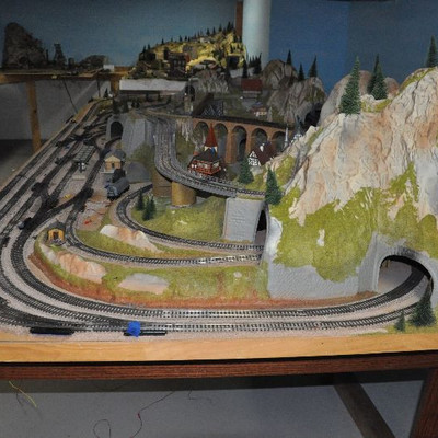 Another view of Bid Package #6- Marklin Train set includes accessories shown in photos.