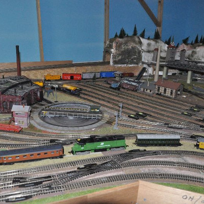 Another view of Bid Package #8- Marklin Train set includes accessories shown in photos.