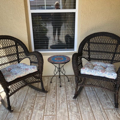 Two resin wicker rockers