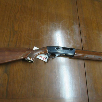 Remington 1100 12 ga. Shot Gun