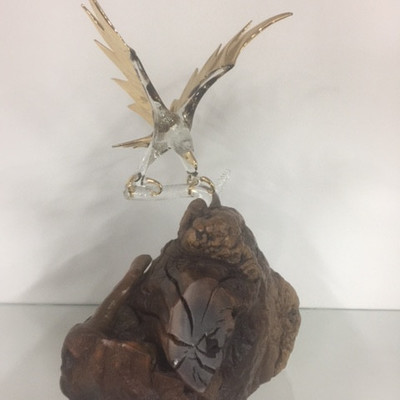 art glass eagle on natural wood base