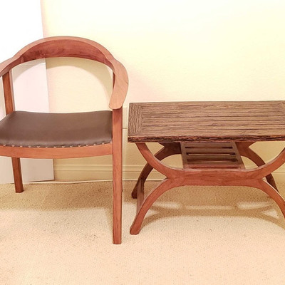 604: 	
Hand Carved Table and Chair
Hand Carved Table and Chair. Table Measures Approximately 28