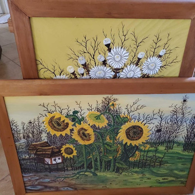 472: 	
Two Framed Floral Carved Wood Paintings
Each measures approx 40