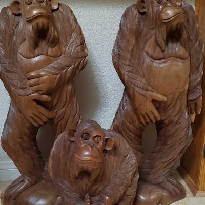 201: 
Three Hand Carved Wooden Ape Statues
Measures approx 32