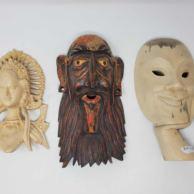 276:
Three Handcarved Wooden Masks
Measures approx 8