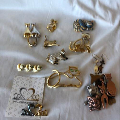 Kirks Folly and cat pins. A clouder of cats