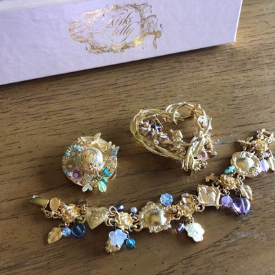 Kirks Folly Brooches and Bracelet