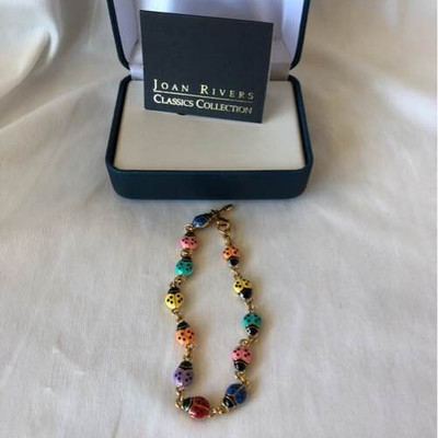 Joan Rivers ladybug bracelet