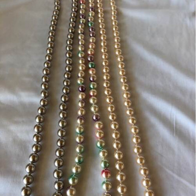 Three strands of Joan Rivers collection pearls
