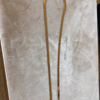 Gold chain necklace marked 14 karat