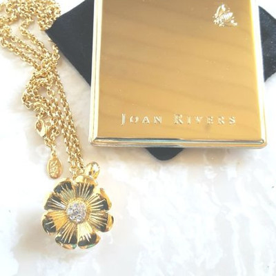 Joan Rivers bee and flower