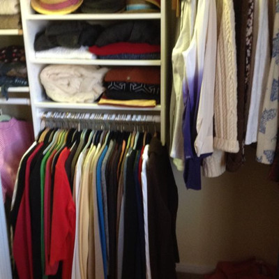 Three closets full of Cashmere sweaters, designer blouses, coats, leather jackets Size Large. Shoes are size 9.