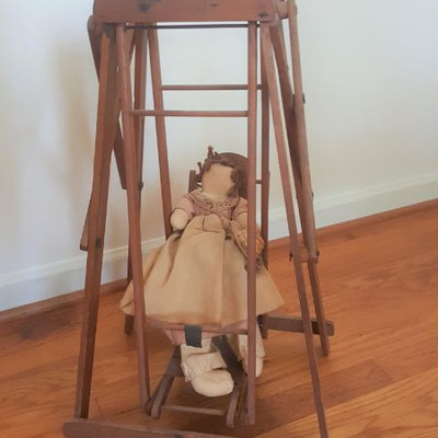 Antique doll and swing