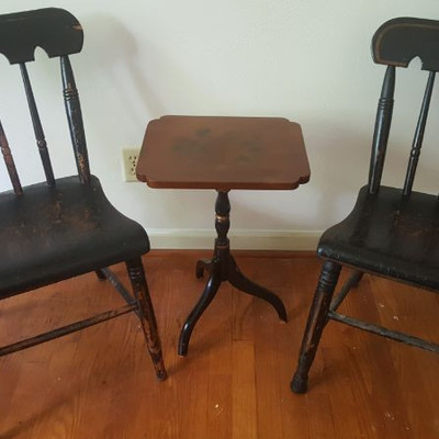 Pair of black antique chairs and tole painted pedestal table