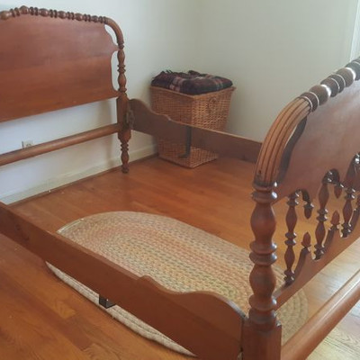 Antique bed with caved acorns 