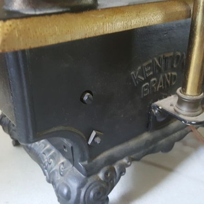 Backside of Royal woodstove - showing Kenton Brand.  Stove has been converted to lamp