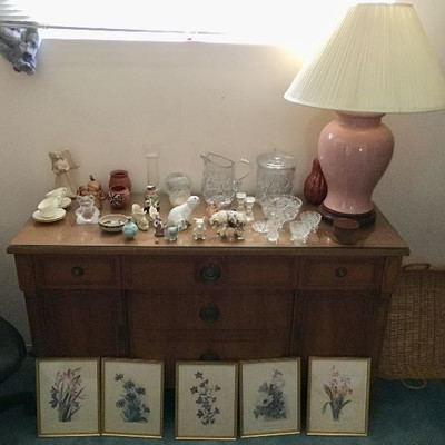 Lovely sideboard, a smaller size great for apartments and smaller homes.  Displayed with knickknacks, crystal, and other items.