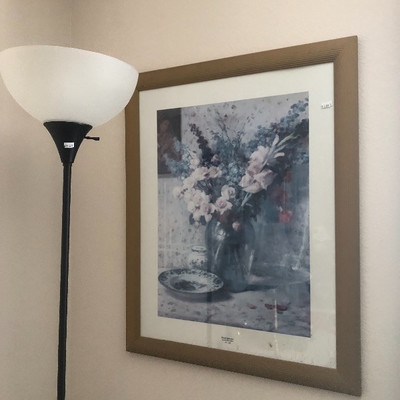 Black torchiere floor lamp, framed floral art
