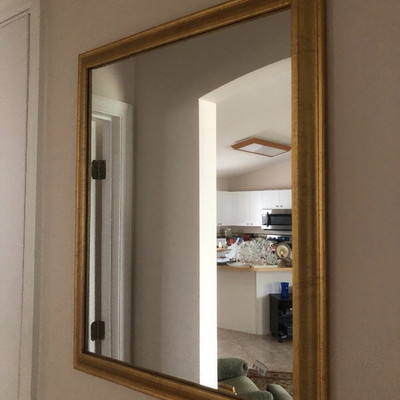 Gold-framed mirror