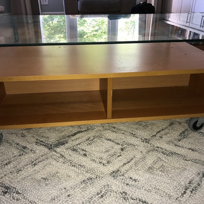 Cocktail table has storage under