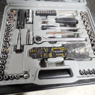 Ratchet wrench with sockets, wire stripper, screw ...